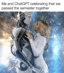 a woman is kissing a robot while they are celebrating that they passed the semester together .