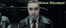 a man in a suit and tie with the words avada kedabra written above him