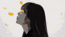 a painting of a woman with orange hair and yellow petals