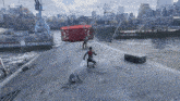 a man in a spiderman suit is running in front of a large red container that says ' spiderman ' on it