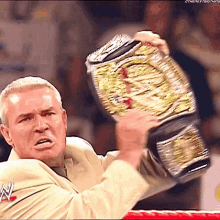 Eric Bischoff Wwe Champion GIF - Eric Bischoff Wwe Champion 2005 GIFs