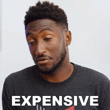 Expensive Marques Brownlee GIF