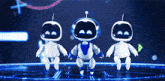 three robots are dancing on a stage with a triangle in the middle