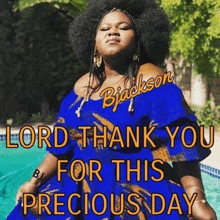 a woman in a blue dress is standing in front of a pool and saying `` lord thank you for this precious day '' .