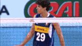 a man wearing a dhl jersey with the number 29 on it