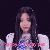 a woman with long black hair says happy birthday pas in pink letters