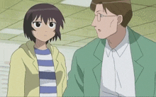 a man and a girl standing next to each other