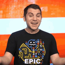 a man wearing a black t-shirt that says epic on it