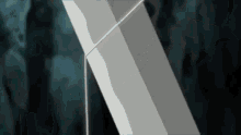 a close up of a sword with a sharp blade on a dark background .