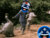 a person with a smiley face on their face is running in the dirt .