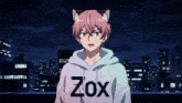 a boy with cat ears is wearing a hoodie with the word zox on it