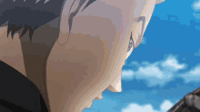 a close up of a person 's face with a blue sky behind them