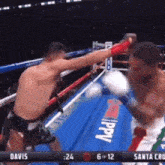 a boxing match between davis and santa cru is being shown on tv