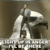 a man standing on top of an eagle with the words light up in anger i 'll be there written below him