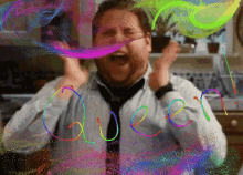 a pixelated image of a man with the word queer written on his face