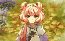 a girl with pink hair is holding a cat in her lap