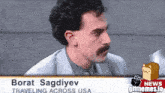 a man with a mustache is being interviewed by a news channel