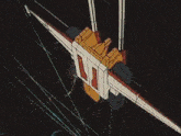 a red , white and blue robot is flying through the air .