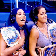 sasha banks bayley womens tag team champions laugh laughs