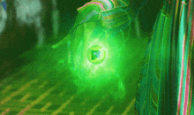 a green glowing object with the letter f on it