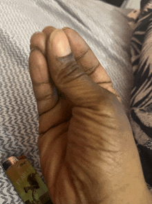 a person holding a lighter that says bic fearless on it