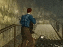 a man in a blue jacket is running down a set of stairs .