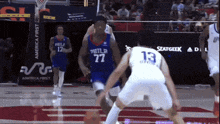 a philadelphia basketball player is dribbling the ball
