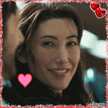 a picture of a woman with a pink heart in the corner and picmix at the bottom