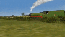 a green train has the number 3 on the side of it
