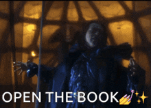 a picture of a witch with the words open the book below it