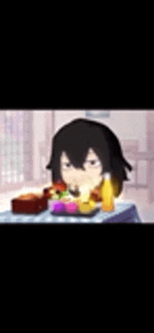 a person is sitting at a table with a box of food and a bottle of orange juice .