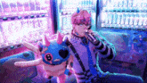 a man with pink hair is holding a microphone and a stuffed animal with horns and the number 8 on it