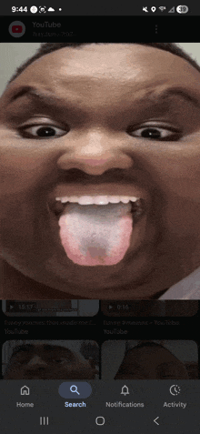 a screenshot of a person 's face with their tongue out on youtube