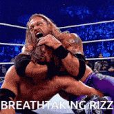 two wrestlers in a wrestling ring with the words breathtaking rizz below them