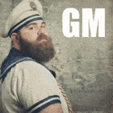 a man with a beard is wearing a sailor 's outfit and the word gm is on the bottom right