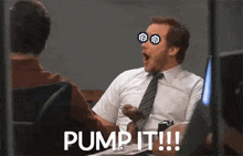 a man in a suit and tie is sitting at a desk with his mouth open and the words pump it written on his face .