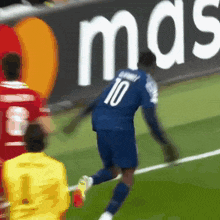 a soccer player with the number 10 on the back of his shirt