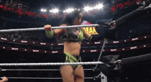 a woman in a wrestling ring with the word ram written on the ropes