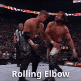 two men are wrestling in a wrestling ring and the words rolling elbow are on the screen