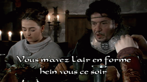 a man and a woman are sitting at a table with the words vous mavez l' air en forme