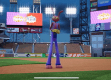 a cartoon character is standing on a baseball field in front of a scoreboard that says kaak