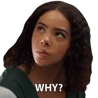 a woman with curly hair is looking up and says why