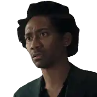 a man with a surprised look on his face is wearing a green jacket