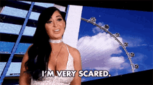 a woman in a white dress says i 'm very scared