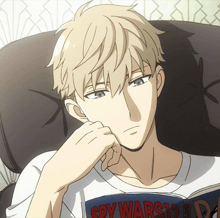 a man is reading a book titled spy wars