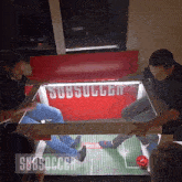 a group of men are playing a game of subsoccer