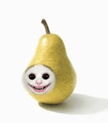 a yellow pear with a white face on it .