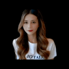 a woman stands in front of a screen that says " are you ready to watch "