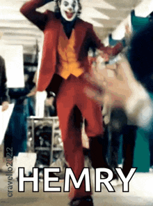 a man in a joker costume is dancing with the word hemry in the background