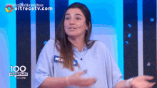 a woman with a name tag that says mer s on it